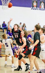 
Coal Grove Hornets Owen Johnson (23) is off-balance as he goes in for a layup against the Chesapeake Panthers on Saturday. (Tim Gearhart Sports Photos/For The Ironton Tribune)