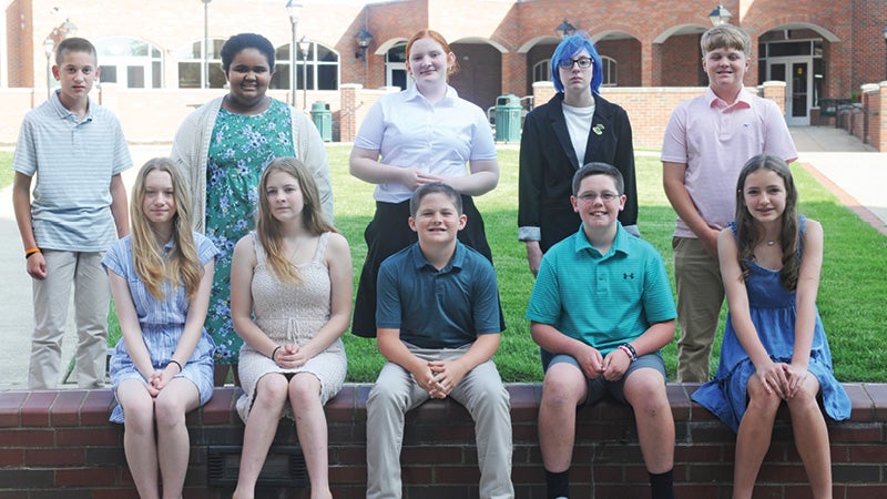 The 2023-24 Eddy Award winners were, front row, from left: Quinn Holtzapfel, Ellen Rudmann, Troy Erlenwein, Trace Fraley and Ella VanHoose; back, David Leith, Jasmine Ward, Regina Kelly, Olive Simmons and Cohen Dressel. (The Ironton Tribune | Heath Harrison)